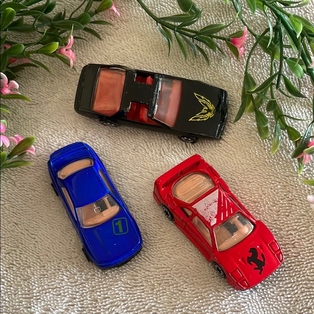 Black, Blue, and Red Toy Cars Set